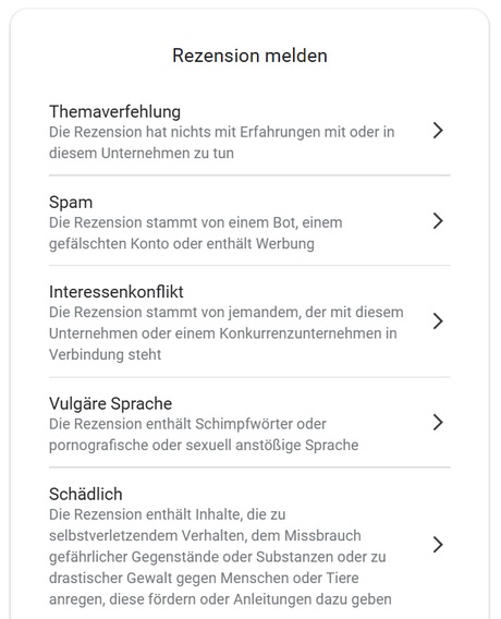 Google-Auswahlmenü zum Melden einer Rezension mit den Gründen Themaverfehlung, Spam, Interessenkonflikt, Vulgäre Sprache und Schädlich